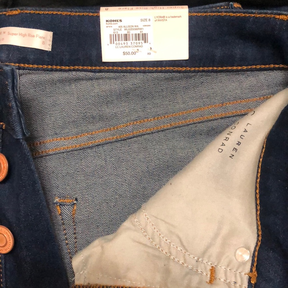 Brand new never used. Size 8, super high rise Flare